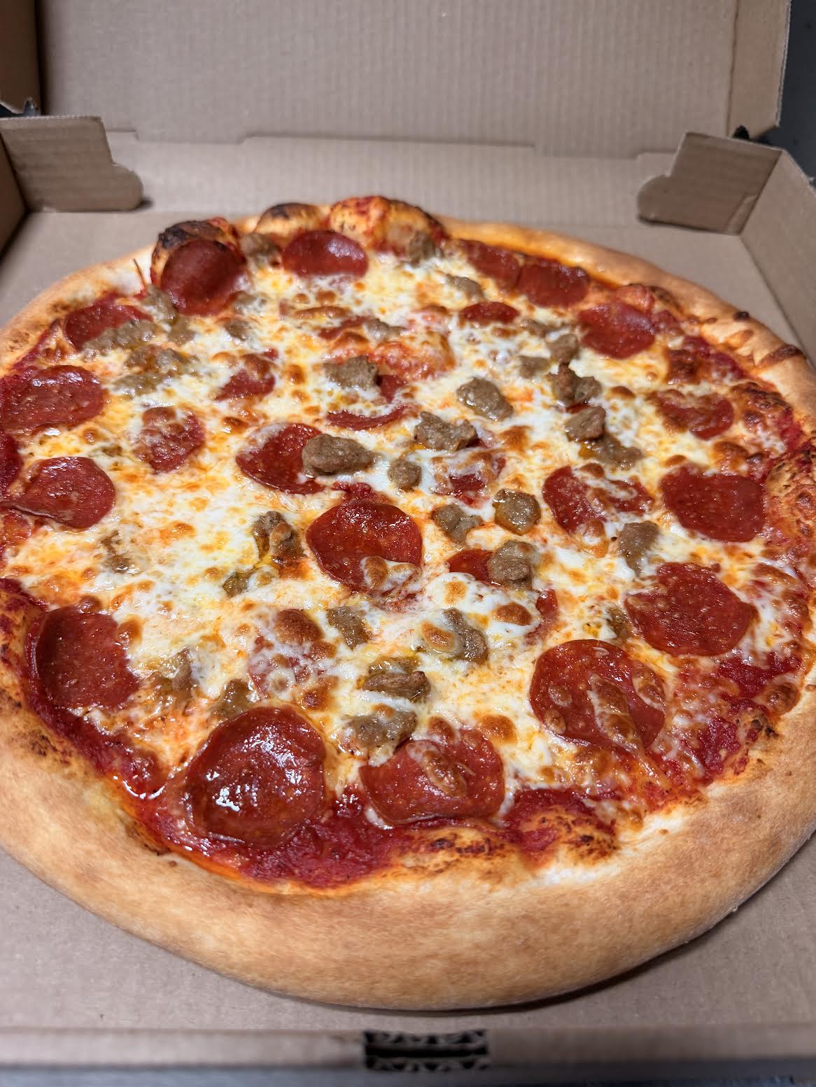 Photo of the dough mid-toss